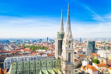 Fototapeta na wymiar Croatia, capital city of Zagreb, aerial view of city centre and cathedral towers from drone