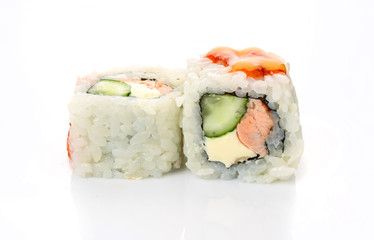 traditional fresh japanese sushi rolls on a white background