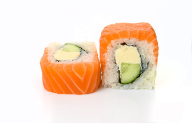 traditional fresh japanese sushi rolls on a white background