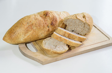 Sliced ​​french bread on a table in a cozy coffee shop