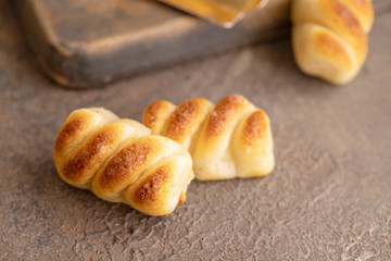 Spanish Christmas marzipan sweets, Figuritas de mazapan with christmas decoration on wooden cut board. Traditional treat consumed during winter holidays in Spain.