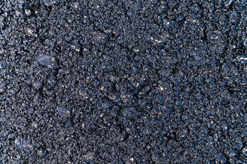 Black asphalt (bitumen) road background or texture