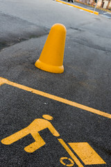 yellow goods unloading signs on the ground