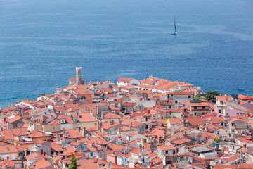 Piran, Slovania aerial panorama over the old city with its iconic red roofs and the Mediterranean sea 