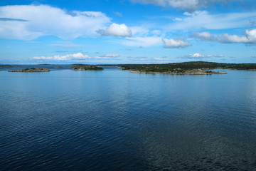 Fototapeta premium The Picture from a ferry between Sweden and Finland. The small Swedish islands are visible from the boat. 