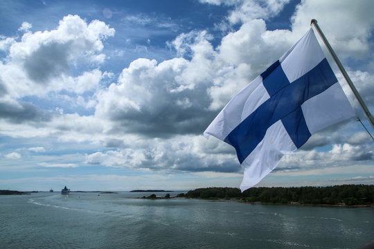 The Picture from a ferry between Sweden and Finland. The fiinnish flah is hanging on the back part of the ship. 
