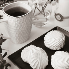 Glamorous coffee in with mug with sweets