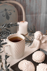 Glamorous coffee in with mug with sweets