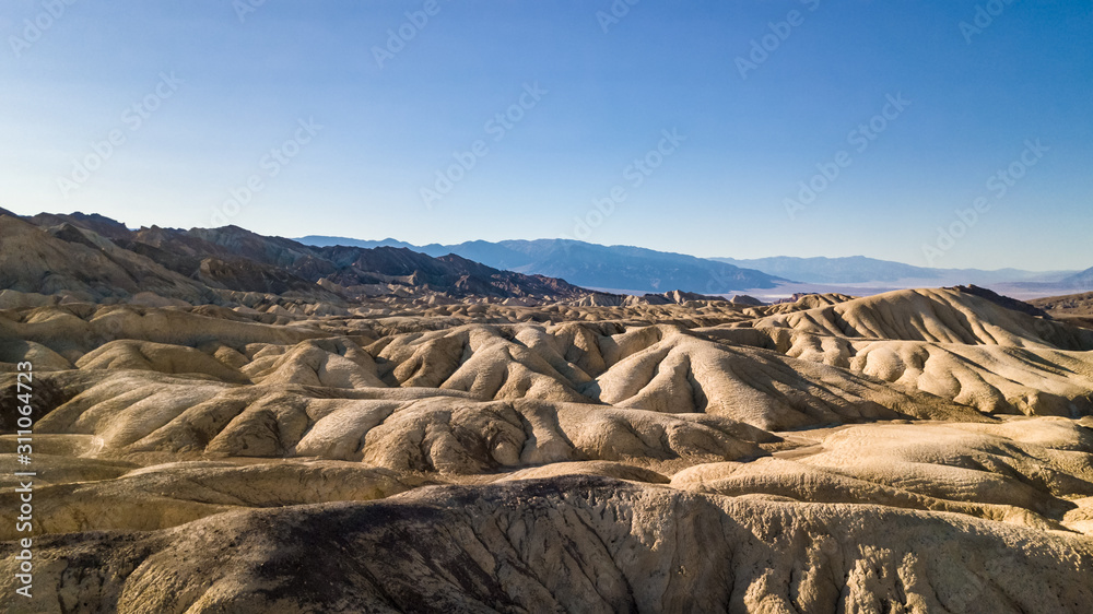 Wall mural Panoramic drone view of the Death Valley landscape at Zabriskie Point 