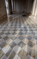 Marble white and grey checkerboard tiled floor  