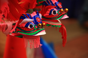 Obraz premium Dragon lanterns and ornaments sold in the street of Yaowarat (Chinatown) in Bankok Thailand in preparation for the Chinese New Year or Lunar New Year