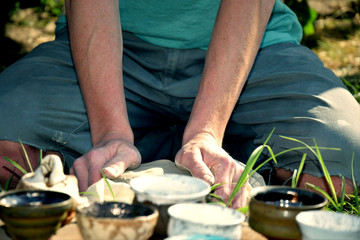 a master class in modeling clay dishes for a company of people