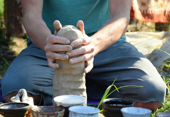 a master class in modeling clay dishes for a company of people