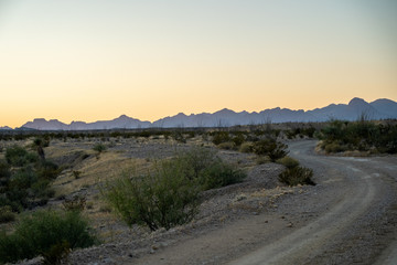 The sun begins to set over the mountains of West Texas. 