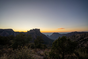 The sun begins to set over the mountains of West Texas. 