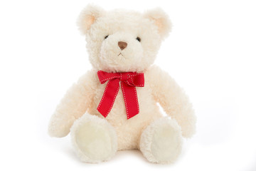 white plush fluffy Teddy bear on Valentine's day holiday sits with red satin ribbon on neck isolated on white background
