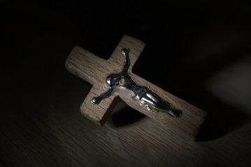 wooden cross with crucifix close up