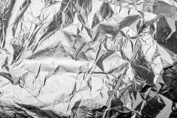 Metal foil texture in black and white. Abstract background