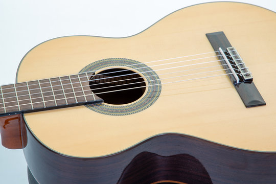Close up of wooden acoustic guitar