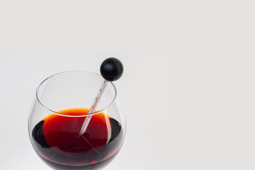 Measuring White Wine Temperature with a Wine Thermometer. There is a place for text.