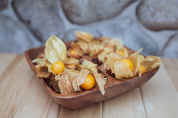 Physalis , golden gooseberry on wooden background