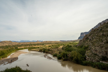 The Rio Grande River cuts a canyon through the plateu that seperates the US and Mexico.