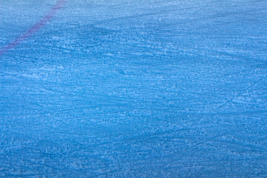 Textures blue ice. Ice rink. Winter background. Overhead view. Nature background