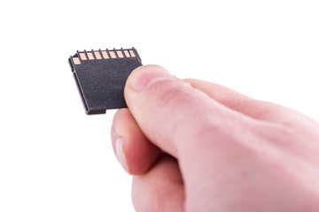 SD memory card with two fingers flash on white background