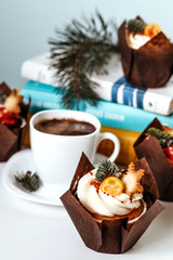 Cup of coffee and cupcake on New Year's Eve.