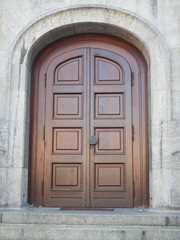wooden door of an old church