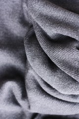 Beautiful grey knitted sweater close up view