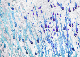 Blue paint splashes on a white wall or raindrops