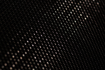 metal mesh texture,black dark background, material pattern