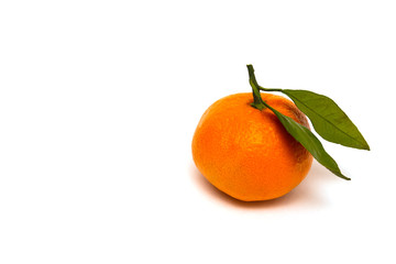 Ripe and delicious tangerine isolated over white background. Organic and healthy food concept. Agriculture and harvest. Vegetarian food. Supermarket banner. Selective focus.