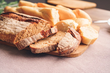Different types of bread lie on the table