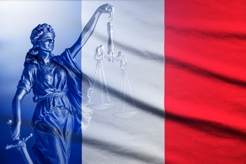National flag of France with a statue of Justice