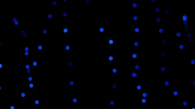 Blue garlands with iridescent light.Christmas and new year decorations.