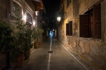 Fototapeta na wymiar Walks in the old city. Night island of Crete.