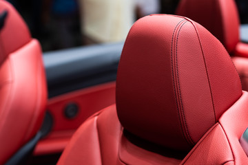 Detail of Luxury red leather car seat in  sport car