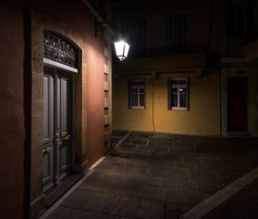 Walks in the old city. Night island of Crete.