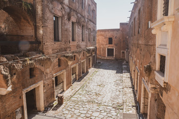 Fototapeta na wymiar Ruins in Via dei Fori Imperiali, Rome, Italy.