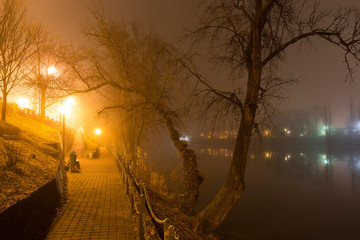 Thick Fog in the night Holesovice about River Vltava. Holesovice is the most cool Prague District, Czech Republic. © Kajano