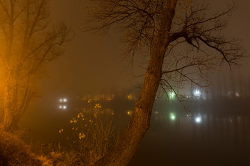 Thick Fog in the night Holesovice about River Vltava. Holesovice is the most cool Prague District, Czech Republic. © Kajano