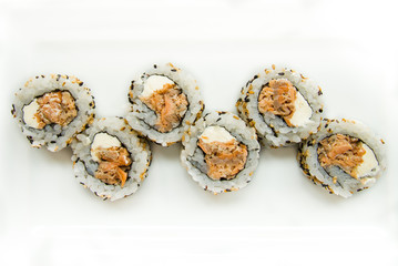 tuna uramaki on white background, salmon uramaki japanese food, top view, japanese food, sushi