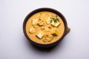Mushroom Paneer curry or sabzi, served in a bowl. selective focus