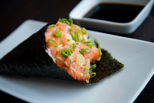 temaki cone-shaped sushi with raw salmon, japanese food, philadelphia temaki, temaki, temaki with salmon, horizontal image, asian food, japanese cuisine