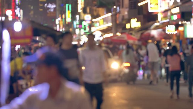 Unrecognizable people on the street in Ho Chi Minh City, Vietnam.