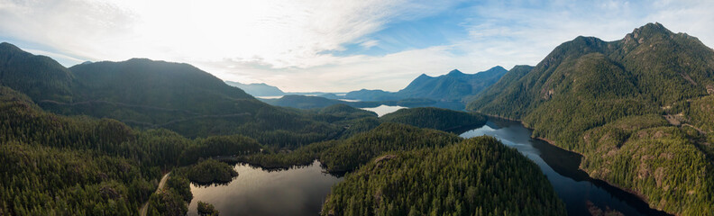 Fototapeta na wymiar Beautiful Aerial Panoramic View of Larry Lake during a vibrant sunny day. Located on the West Coast of Vancouver Island near Tofino and Ucluelet, British Columbia, Canada.