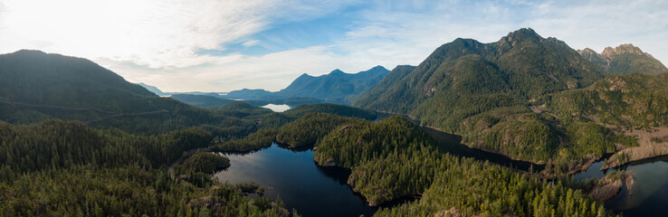 Beautiful Aerial Panoramic View of Larry Lake during a vibrant sunny day. Located on the West Coast of Vancouver Island near Tofino and Ucluelet, British Columbia, Canada.