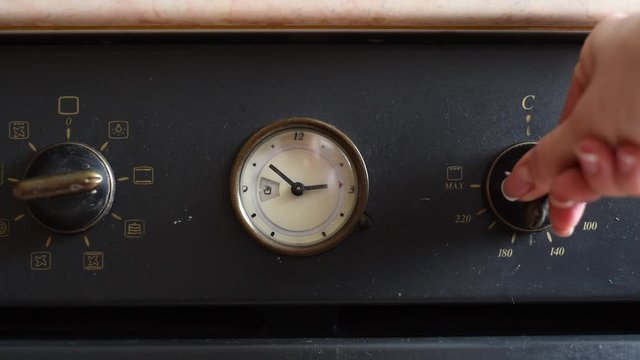 kitchen clock on the oven